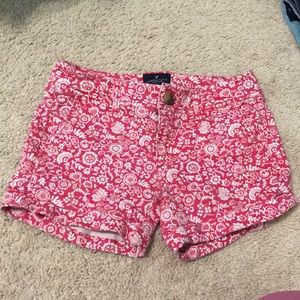 Red and pink American eagle shorts